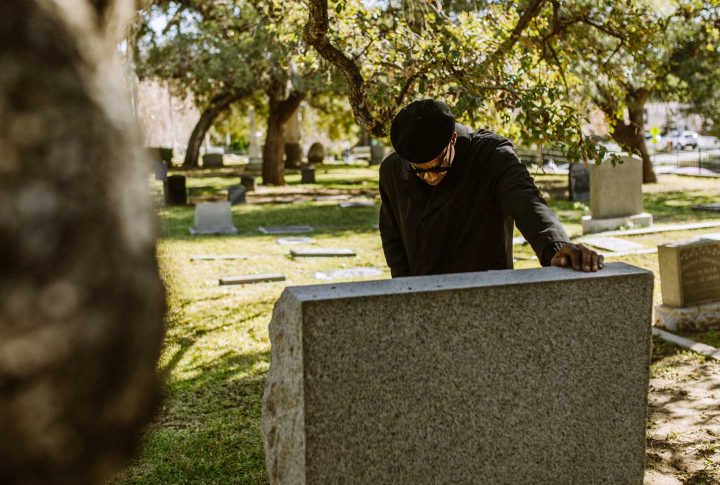 Mourning on the grave of a loved one - Photo by RODNAE Productions from Pexels