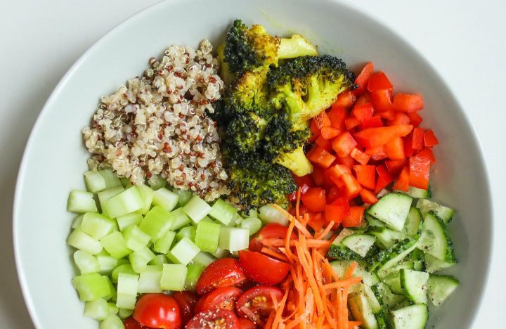 Salad plate with steamed broccolis and cooked quinoa 