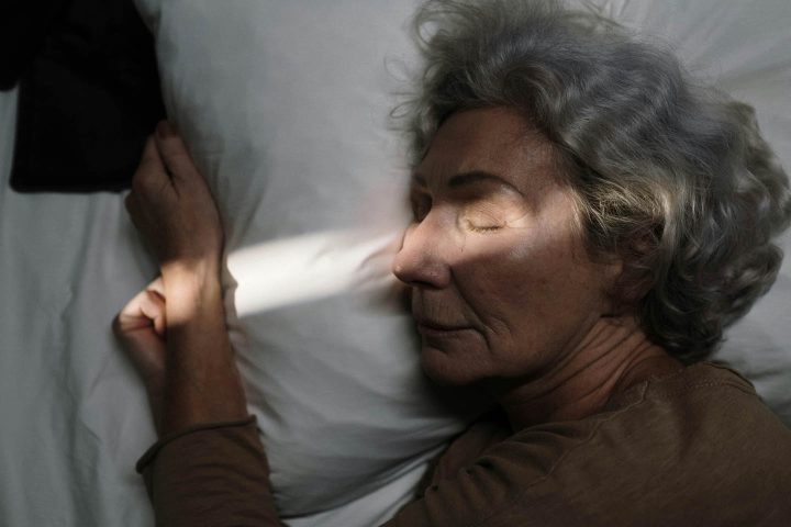 A senior woman sleeping