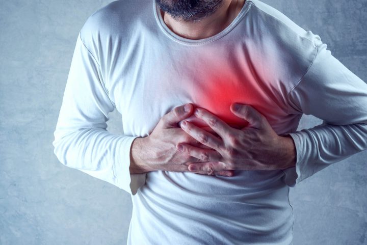 A man suffering from a heart attack
