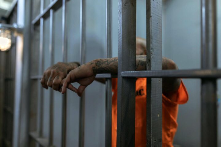 A prisoner behind bars