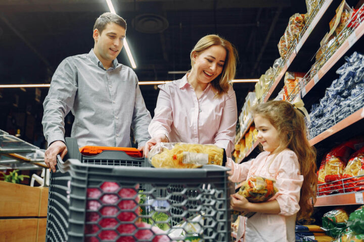 A family goes shopping in a supermarket