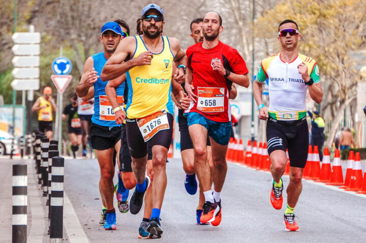 A group of men competing in a marathon