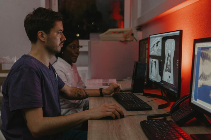 Operator looking at PET scan