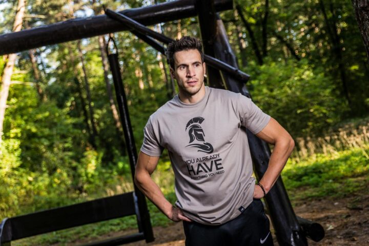 A trained man being satisfied after his exercise routine