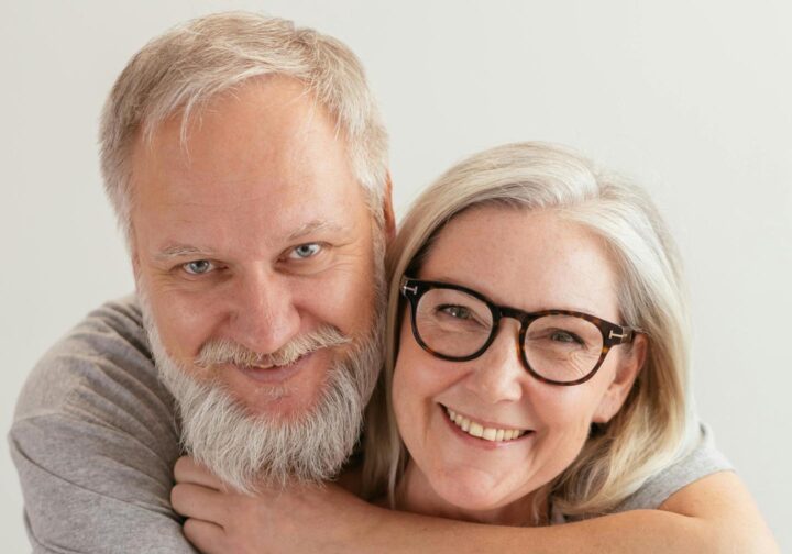An elderly couple with grey hair