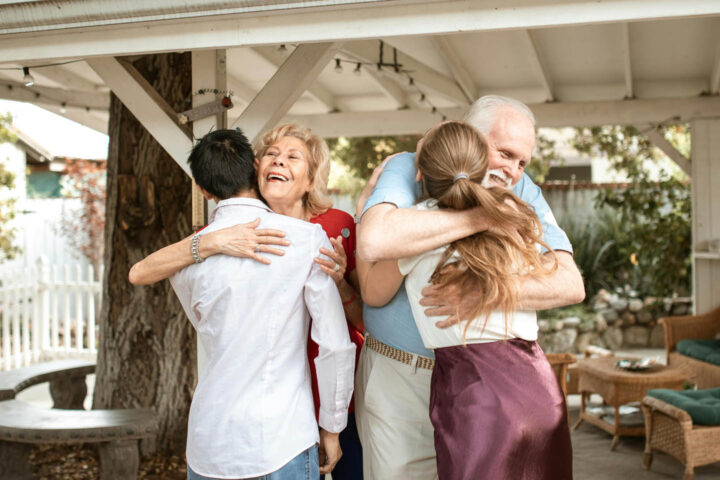 A couple visiting their parents
