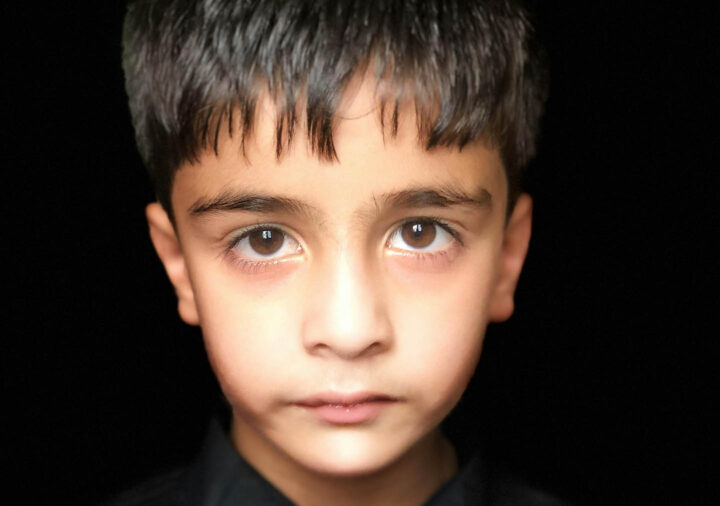 A shy looking kid