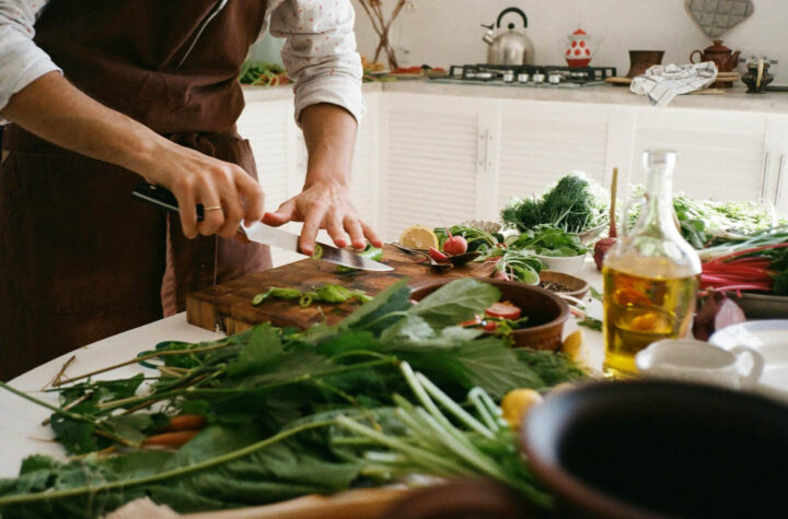 A man cooking some vegetables at home