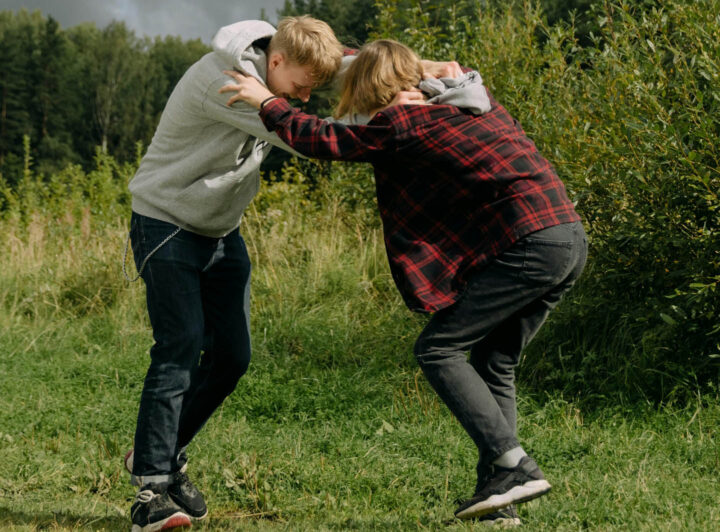 Two boys getting into a fight