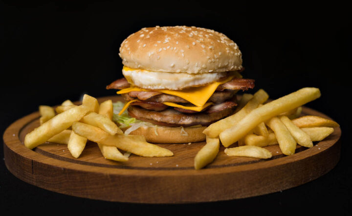Cheeseburger and fries as examples of fatty foods